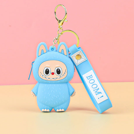 Labubu Cute Coin Purse in blue silicone with a smiling face and keychain, perfect for coins and small items.