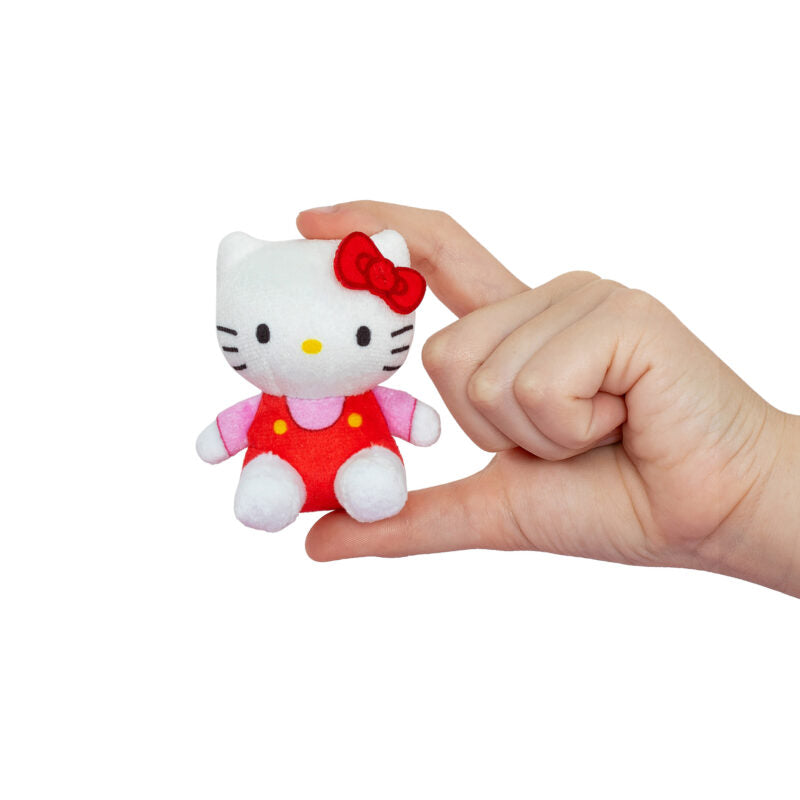 Hello Kitty & Friends Micro Teenies Plush held between fingers showing its small size and detailed design.