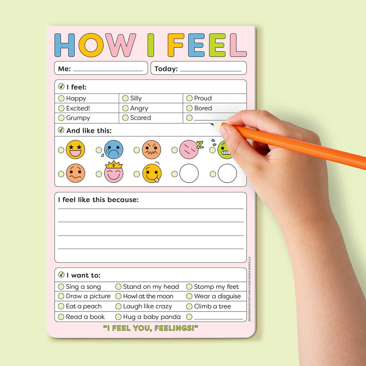 Child filling out a colorful feelings chart on a How I Feel playtime pad with emotional face icons and prompts.
