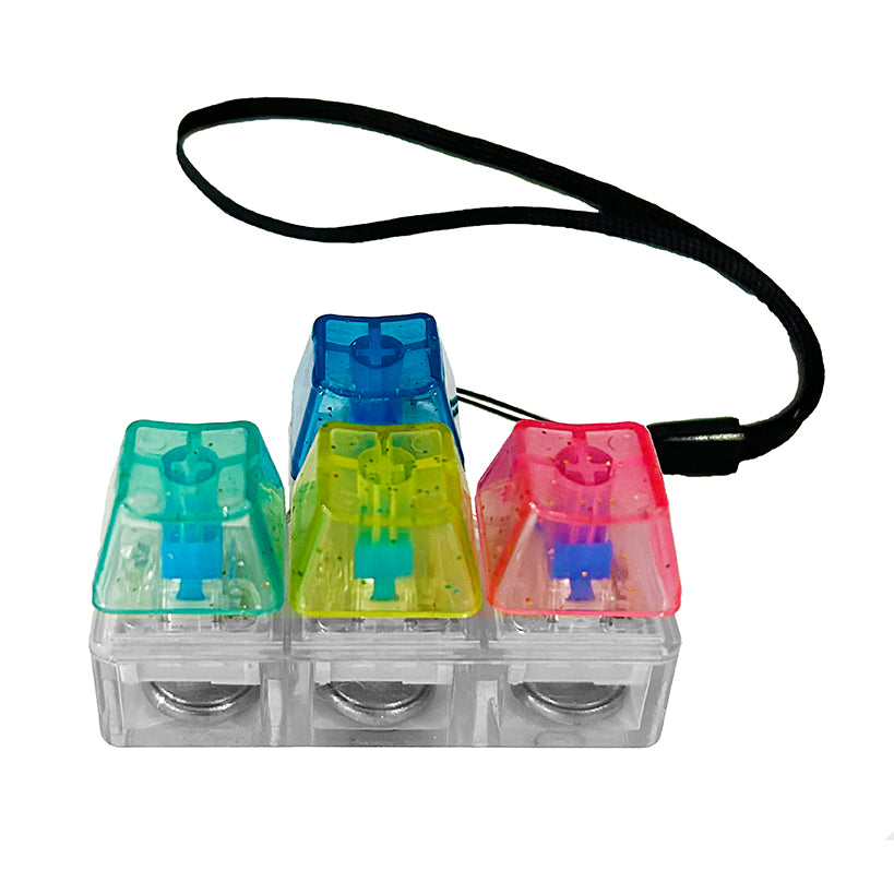 Keybored Fidget mechanical keyboard toy with colorful translucent keys on a keychain for tactile sensory play.