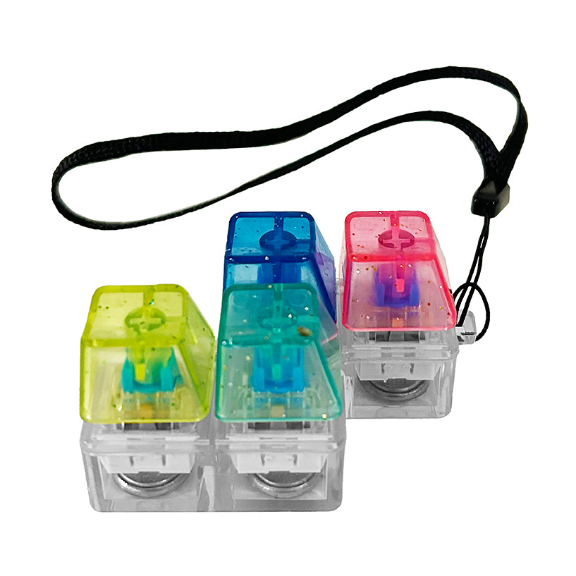 Keybored Fidget LED light-up mechanical keyboard keys in assorted colors with a black wrist strap on white background.