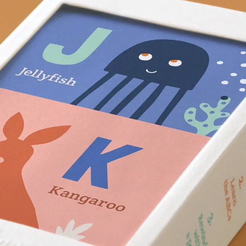 Scrollino ABC Learning Book showing colorful alphabet cards with jellyfish and kangaroo illustrations for kids.