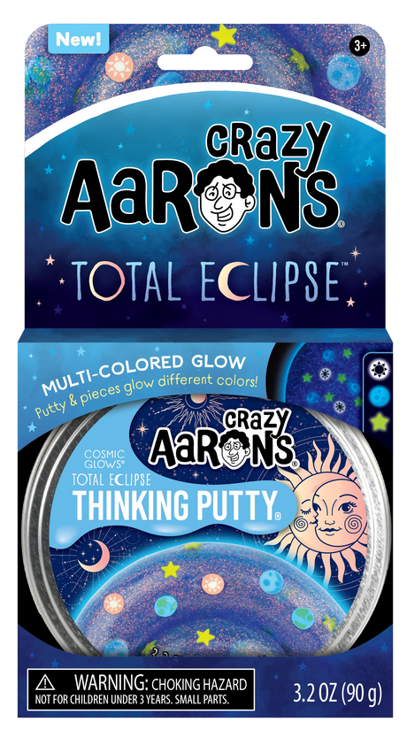 Cosmic Glows Total Eclipse Thinking Putty multi-colored glow putty in collectible space-themed packaging