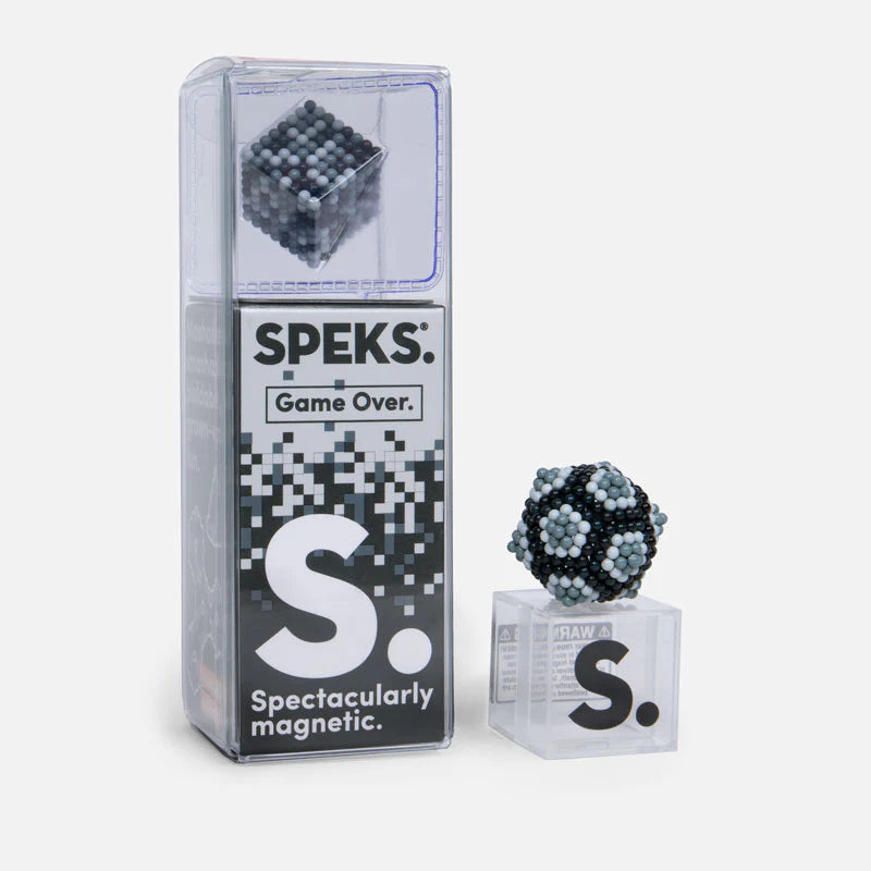 Speks. Pixel. Game Over. magnetic balls in black and white, displayed in packaging and shaped into a pixelated design.