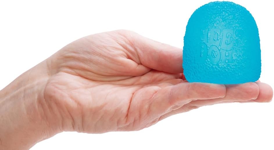 Hand holding a bright blue NeeDoh Gumdrop, a squishy, textured, neon retro toy that springs back when squeezed.