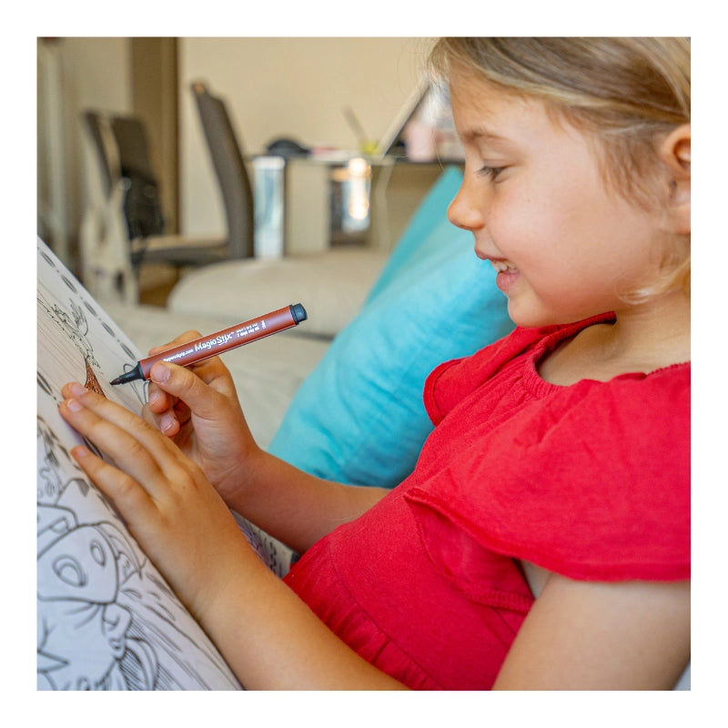 Young girl drawing with a red marker using Magic Stix Markers 12pc, washable and non-toxic for creative fun.