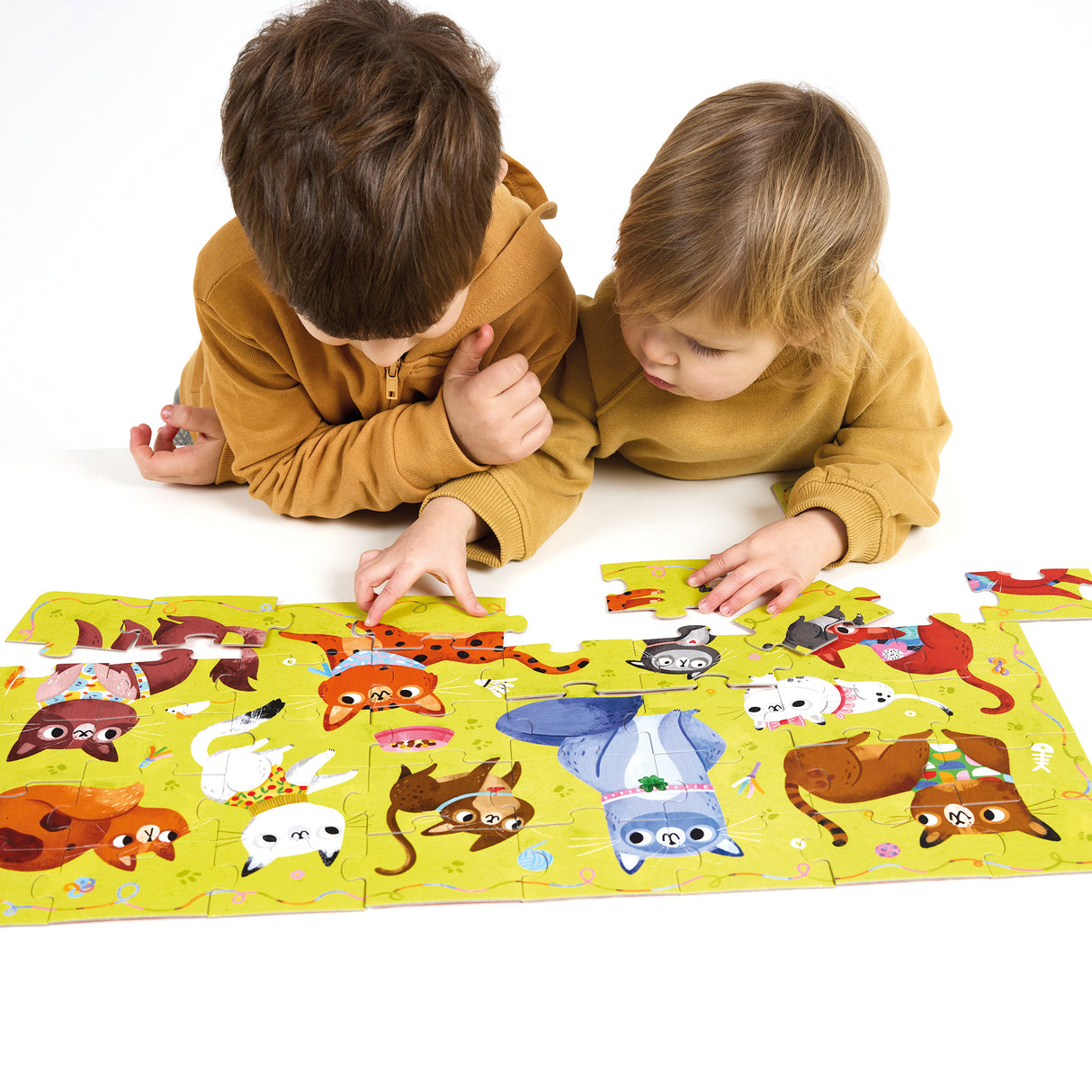 Two children assembling the colorful 40pc I Love Cats Puzzle featuring 10 playful cats and kittens.