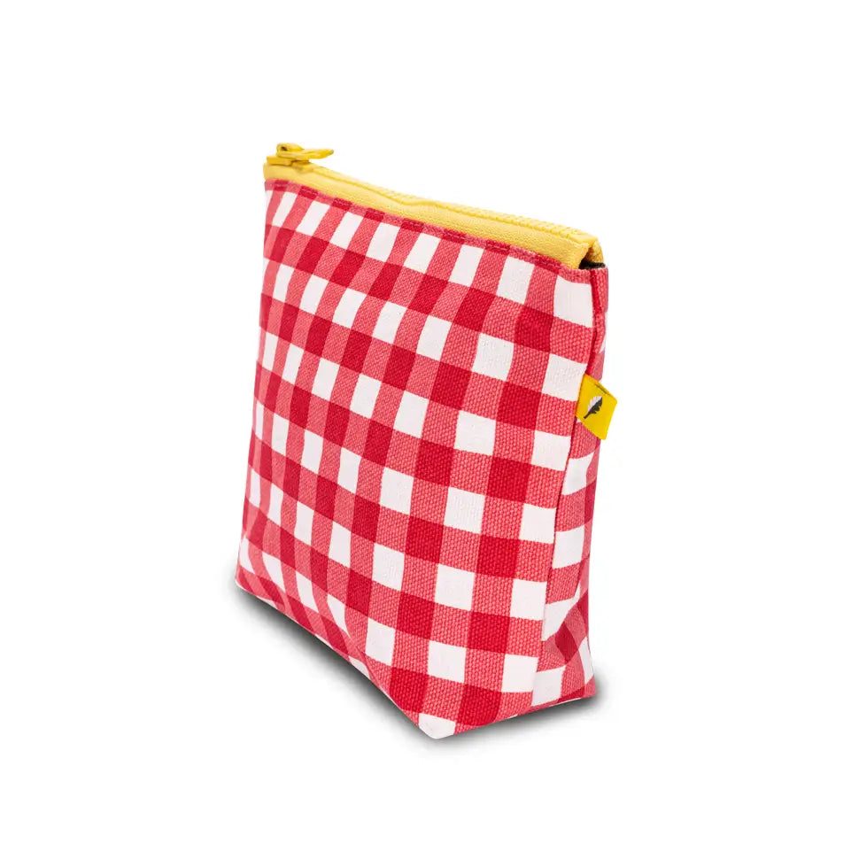 Small pouch with red and white gingham pattern and yellow zipper, made from organic cotton and recycled lining