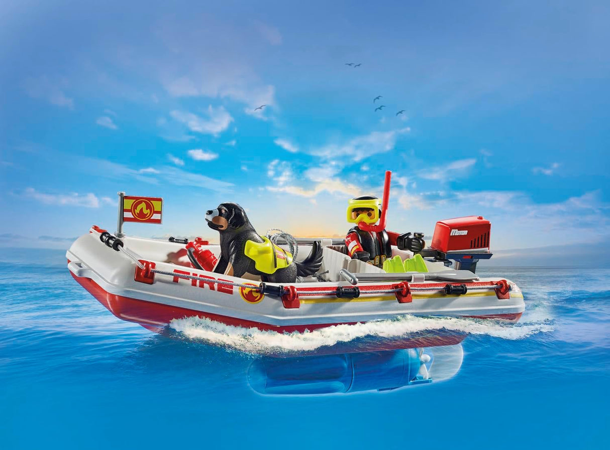 Action Heroes | Fireboat with Water Scooter featuring firefighter, rescue dog, outboard motor, and floating aqua scooter on water.