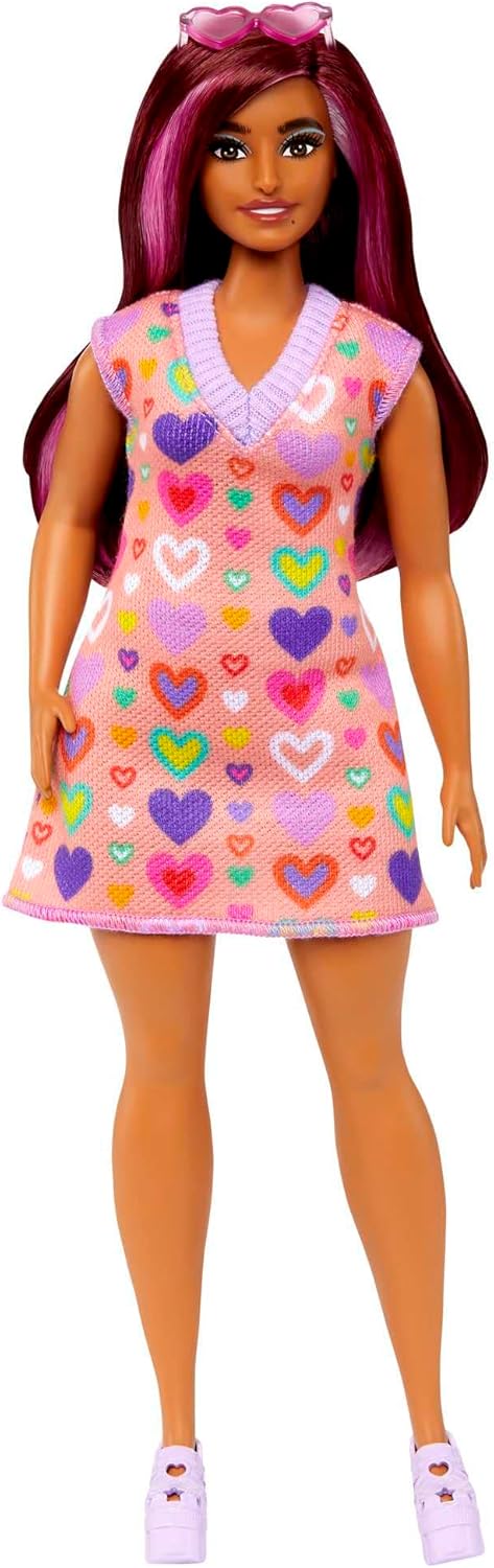 Barbie Fashionista #04 doll with curvy body, heart print peach sweater dress, long pink-streaked hair, and pastel platform shoes.