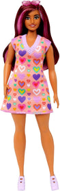 Barbie Fashionista #04 doll with curvy body, heart print peach sweater dress, long pink-streaked hair, and pastel platform shoes.