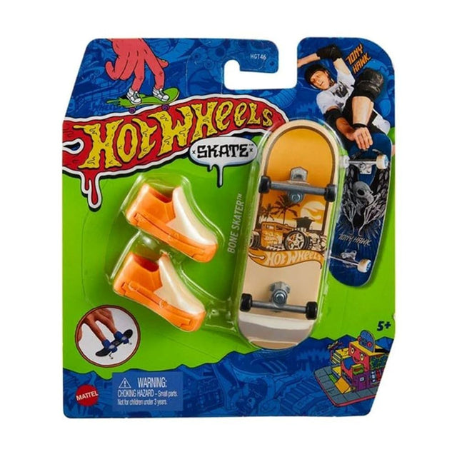 Hot Wheels Skateboard & Shoes mini skateboard toy with orange shoes in colorful packaging for ages 5 and up