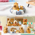 Capybara Figurine Vol 1 Blind Box showing various cute capybara figurines in different poses and costumes.