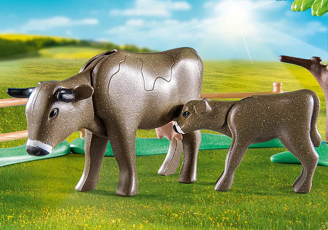 Country | Animal Enclosure with detailed cow and calf figures on a grassy farm setting for children aged 4 and up.