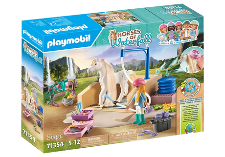 Playmobil Horses of Waterfall Washing Station with figure Isabella and Lusitano mare Lioness for styling and grooming fun.