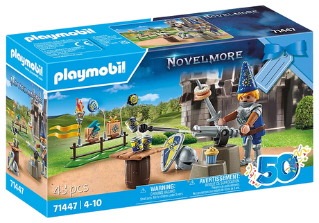 Novelmore | Knight's Birthday set with knight figure, cannon, pastries, and tin can shooting game in decorative box.