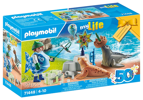 My Life | Keeper with Animals playset featuring seals, a caretaker in fish costume, trumpet, and birthday cake balancing sea lion.