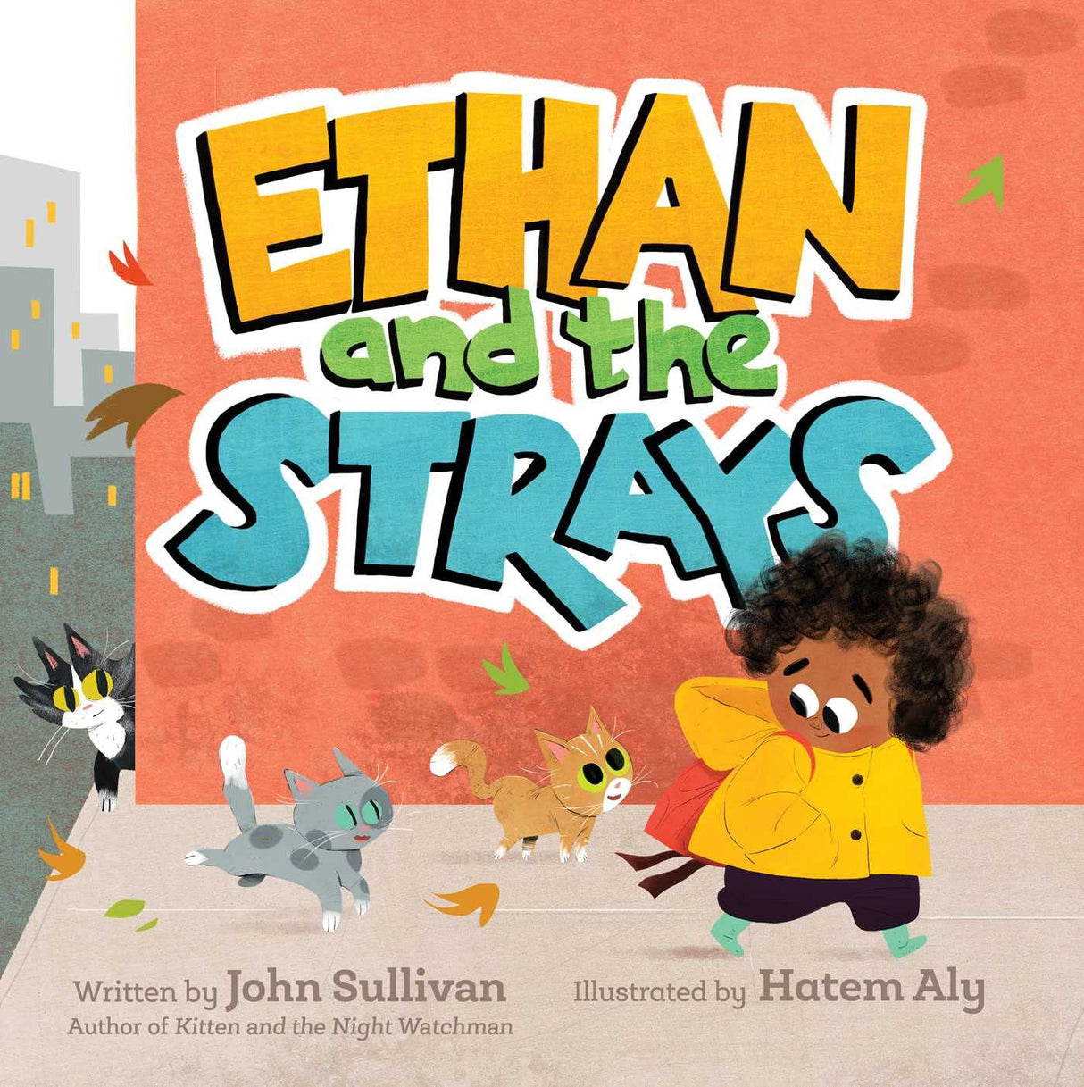 Ethan and the Strays book cover shows a boy watching three playful stray cats near a city sidewalk and brick wall.