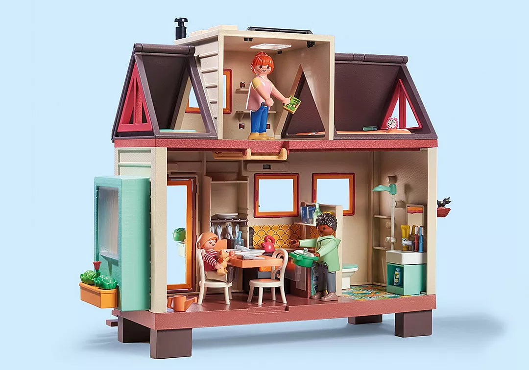 My Life | Tiny House playset with two floors, kitchen, living area, and family figures enjoying cozy home life.