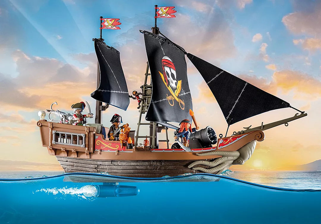 PLAYMOBIL Pirates | Large Pirate Ship with black sails, cannons, and pirate crew set against a sunset sea background.