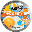 Crazy Aaron's Egg-cellent Thinking Putty tin featuring playful egg-themed design and double fidget fun for sensory play.