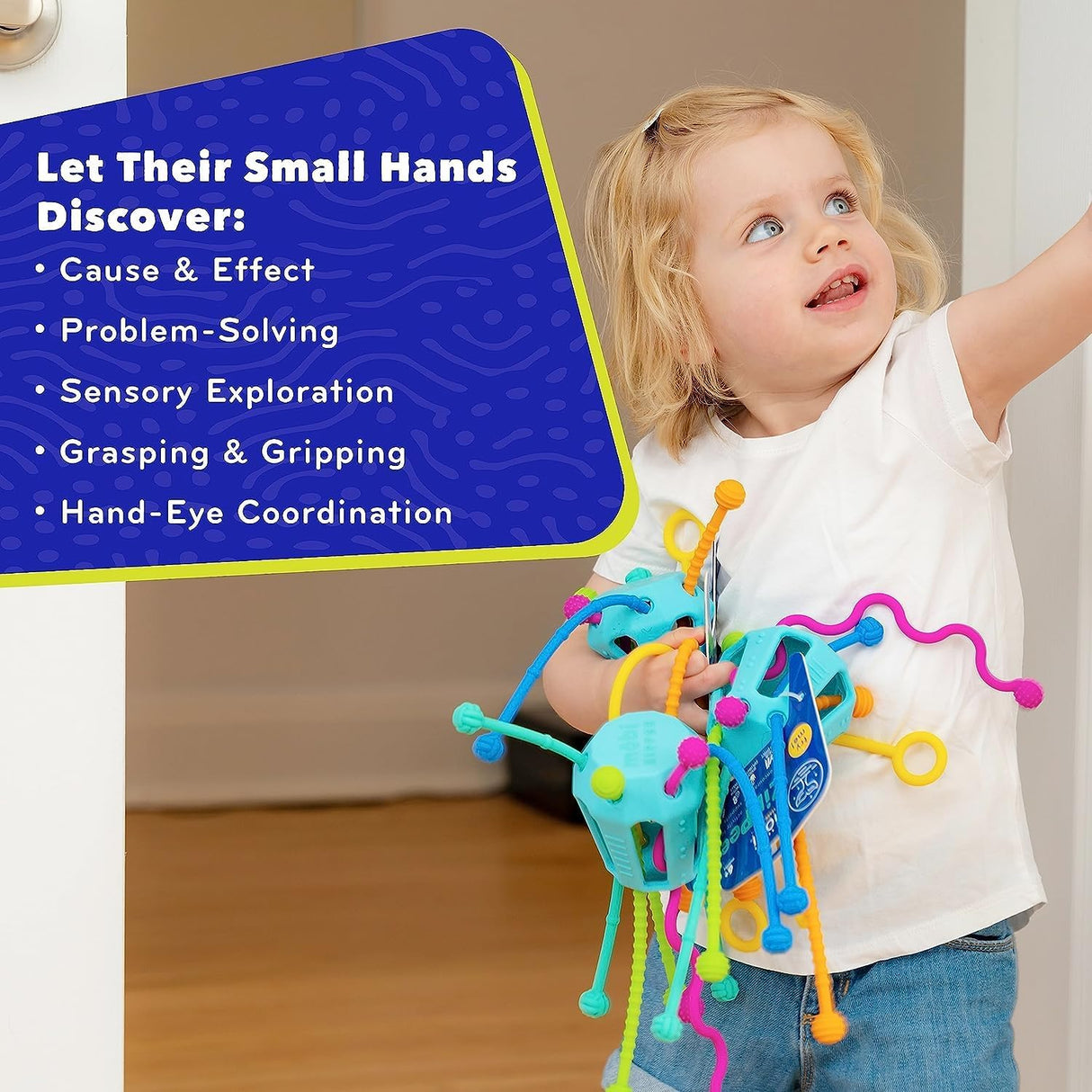 Toddler playing with colorful Zippee Activity Toy promoting sensory and motor skill development.