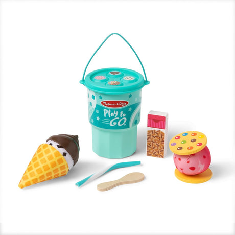 Play to Go Cake & Cookies Play Set with ice cream cone, cookie, utensils, and teal storage cup with handle.
