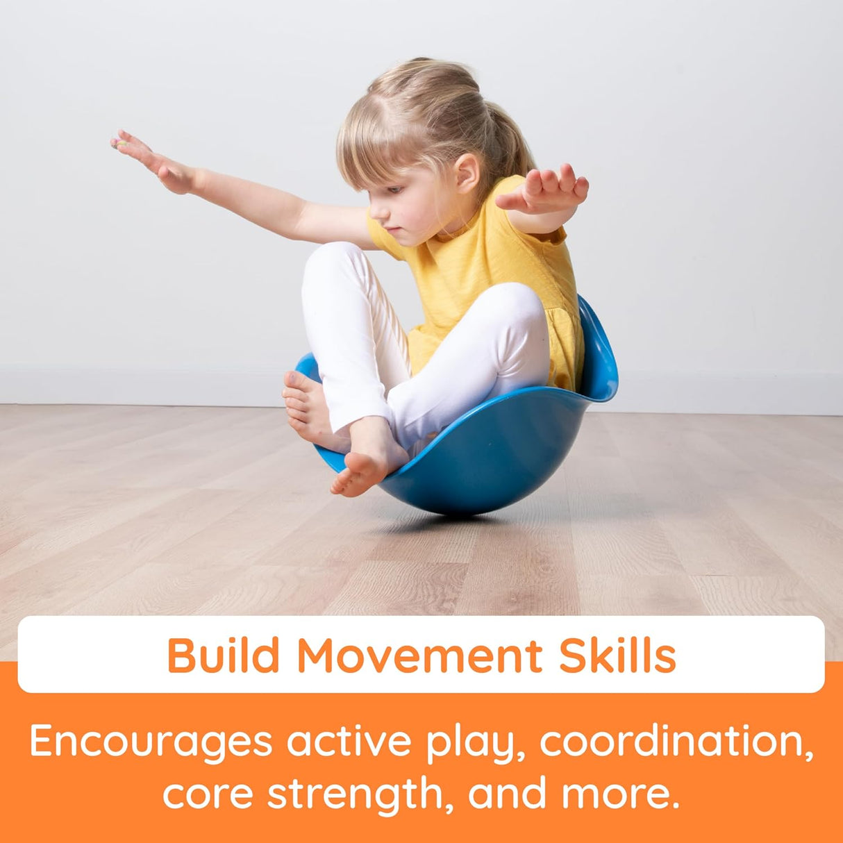 Young child balancing and playing on a blue Bilibo toy promoting active play and coordination skills.