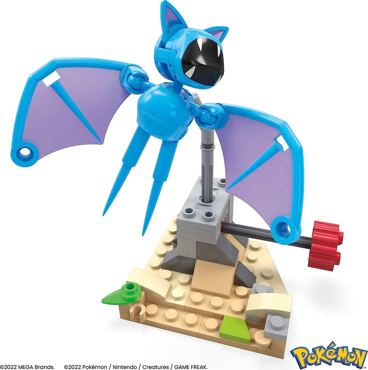 Mega Construx Pokemon Zubat building set with motion feature showing Zubat in flight on a sandy base.