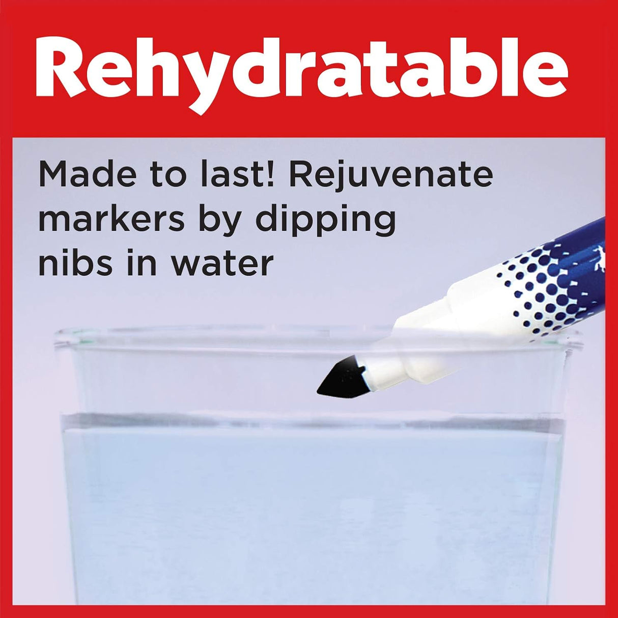 Close-up of a dual-tip marker being rejuvenated by dipping its nib into water to restore ink flow for long-lasting use