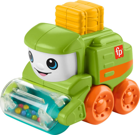 Little People Rollin' Tractor toy with bright colors, smiling face, spinner beads, and a hay bale for sensory play.