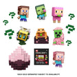 Collection of Minecraft Mini Mode Spawn Egg figures in animated poses with themed capsules for play and display.