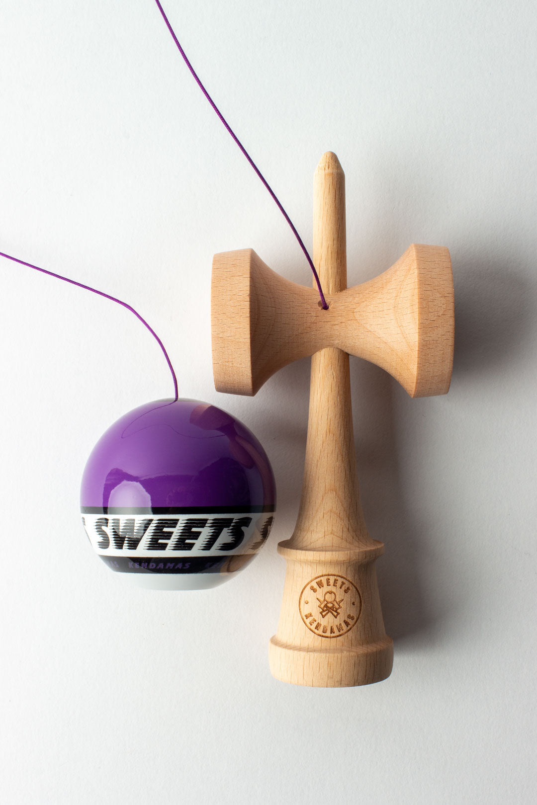 Kendama Starter Purple with beech wood body and purple tama, featuring Sweets logo and beginner-friendly design.