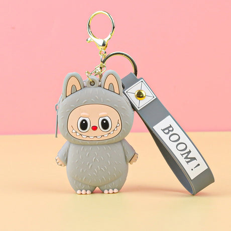 Labubu Cute Coin Purse in gray silicone with a playful character design and attached keychain strap on pink background.