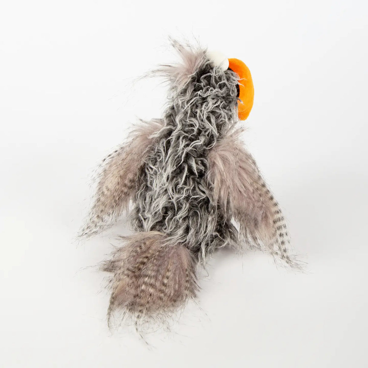 Bird Slow Flyer plush toy with soft, delicate fluffy feathers and an orange beak, perfect for ages 3 and up.