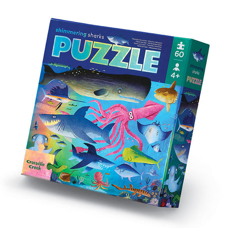 60pc Shimmering Sharks Puzzle featuring colorful sea creatures and sharks, perfect for ages 4 and up.