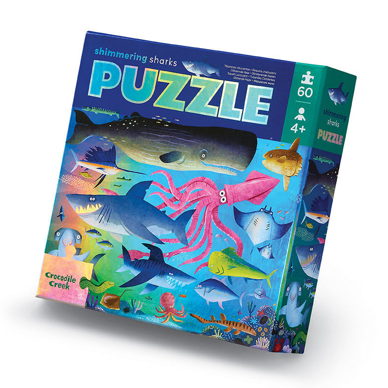 60pc Shimmering Sharks Puzzle featuring colorful sea creatures and sharks, perfect for ages 4 and up.
