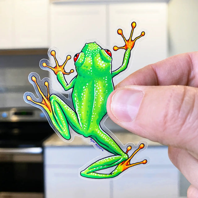Cute Red-Eyed Tree Frog Sticker showing a vibrant frog climbing, durable and waterproof vinyl design perfect for laptops and bottles.