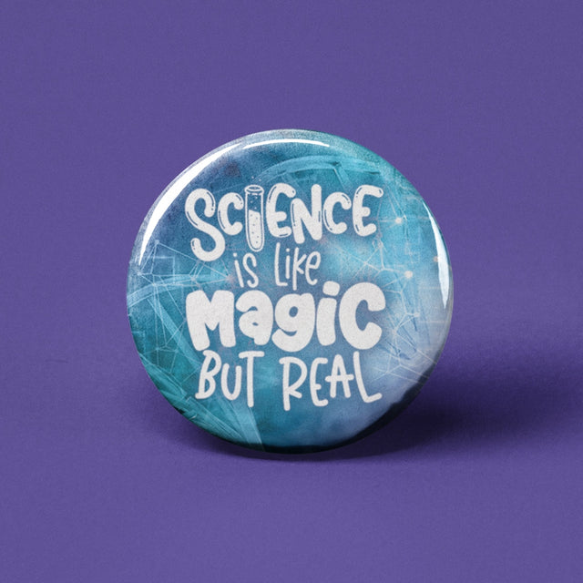 Button | Science is Like Magic But Real with a blue background and white lettering on a 1.25-inch pinback button.