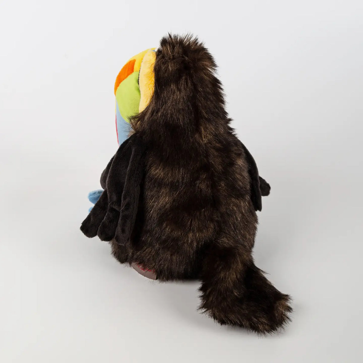 Chakka Tukan Toucan plush toy with colorful beak and soft dark brown fur, perfect for kids 3 years and up.