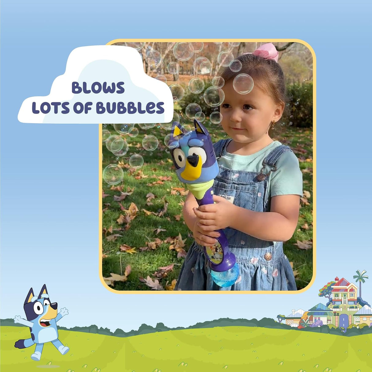 Child playing outdoors with Bluey Lights & Sounds Bubble Wand creating many bubbles in the air.