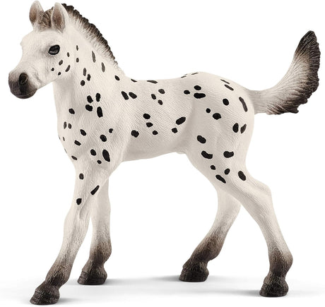 Knapstrupper Foal Horse lifelike toy with detailed black spots, perfect for teaching toddlers about animals.