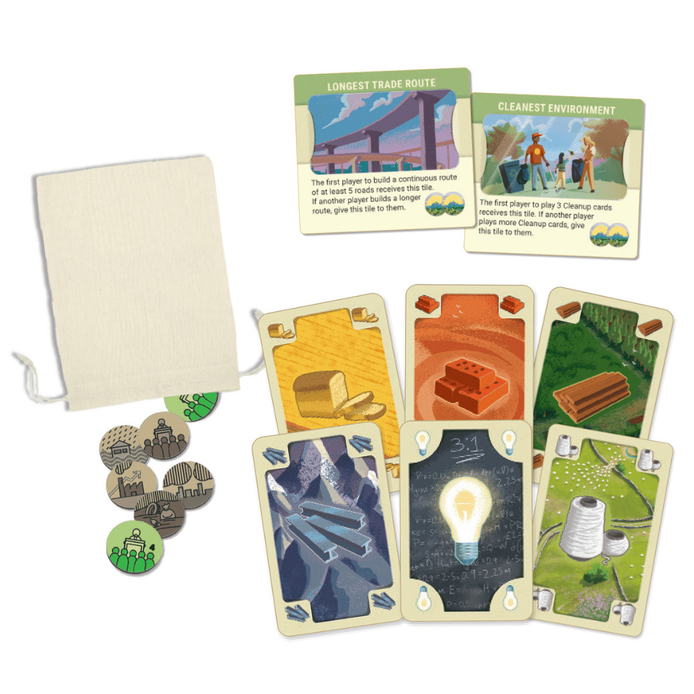 Catan: New Energies game cards and tokens showing resources, energy, and environment challenges.