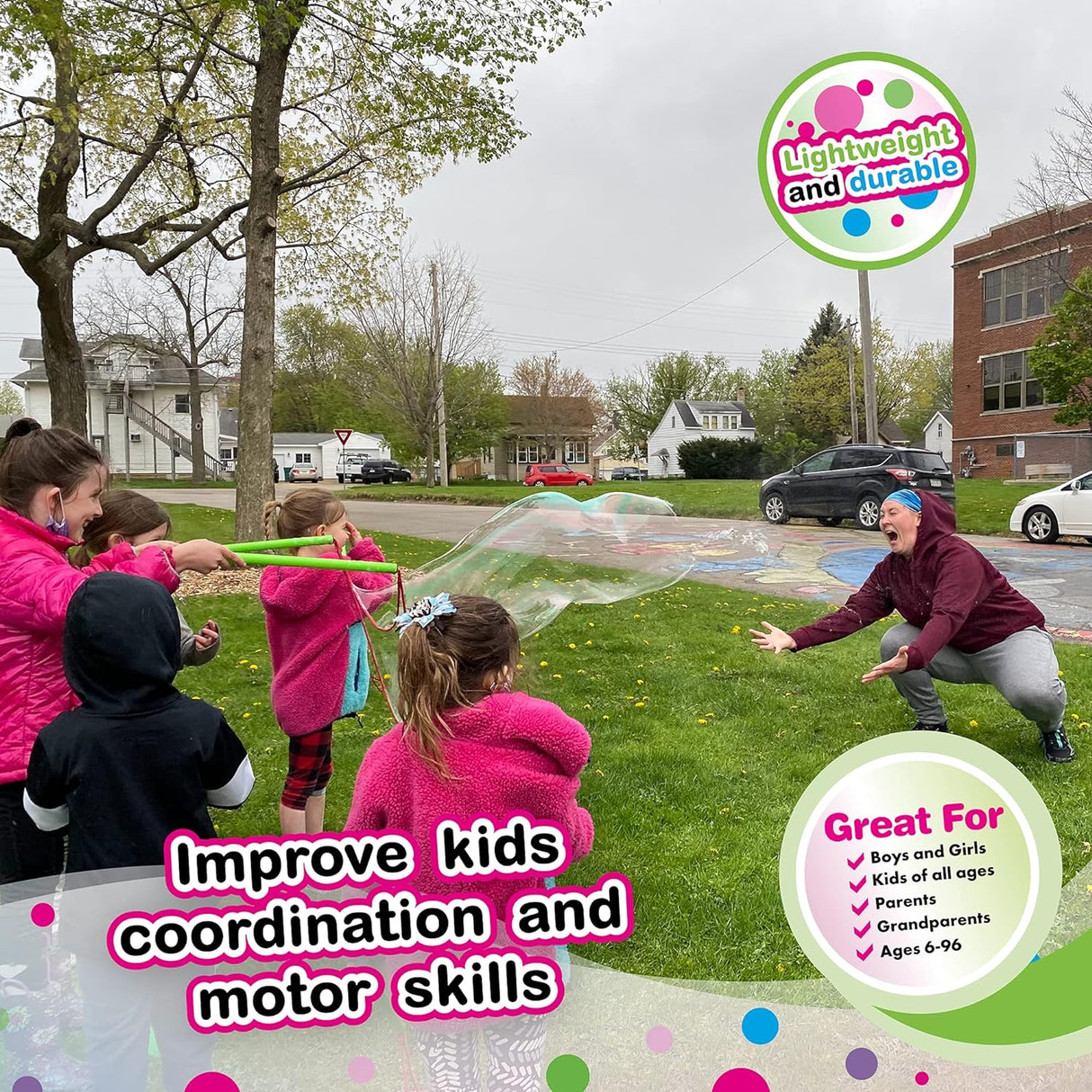 WOWmazing Bubbles Grab-N-Go Giant Bubble Kit used by kids outdoors to create giant bubbles and improve motor skills