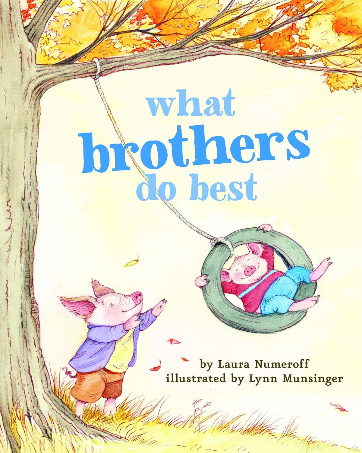 Cover of the board book What Brothers Do Best showing two pig characters playing on a tire swing.