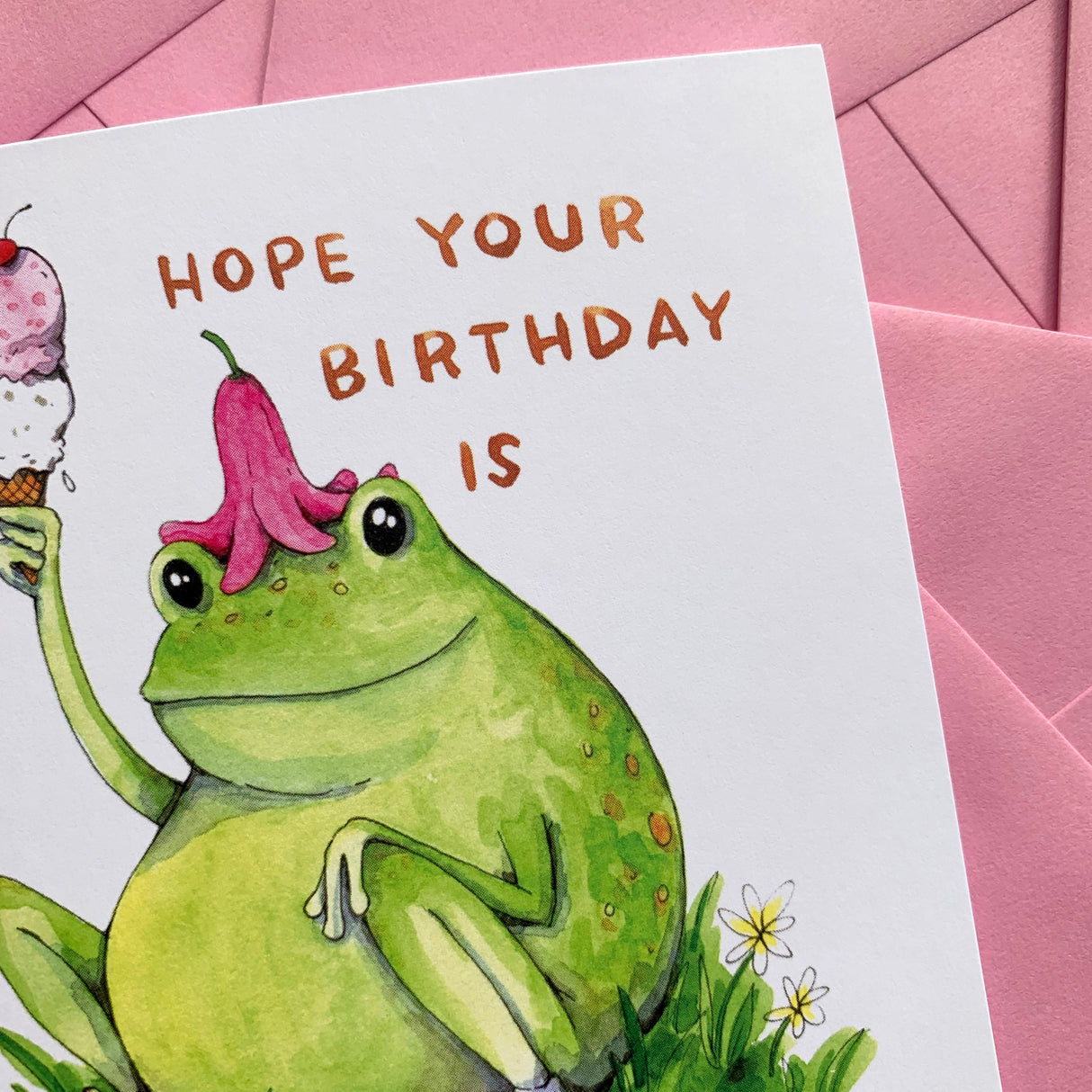 UnFROGettable Frog Birthday Card featuring a watercolor frog holding ice cream with "Hope Your Birthday Is" handlettering.