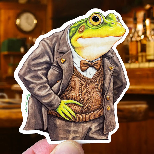 Dapper Frog Sticker featuring a stylish frog in a brown suit and bow tie, durable, waterproof, and UV protected art.