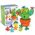 Carlos the Pop & Count Cactus toy with colorful flowers for fine motor skills and counting, stored in an orange pot.