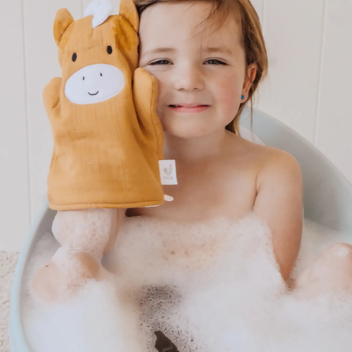 Farm Bath Mitt | Horse shown on a child during bath time with soft cotton muslin and embroidered details.