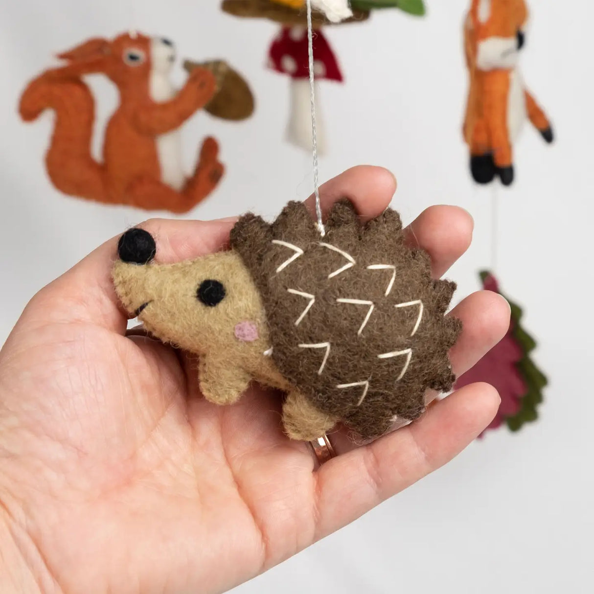 Felt Mobile | Forest Creatures handmade brown hedgehog wool nursery decor with other forest animals in background